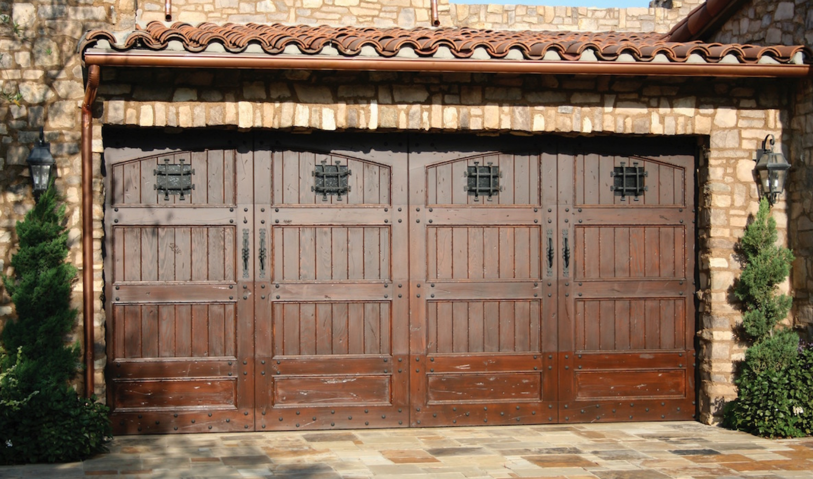A close-up of a rusty metal shutter adorned with colorful graffiti in Hong Kong, ideal for urban art themes.