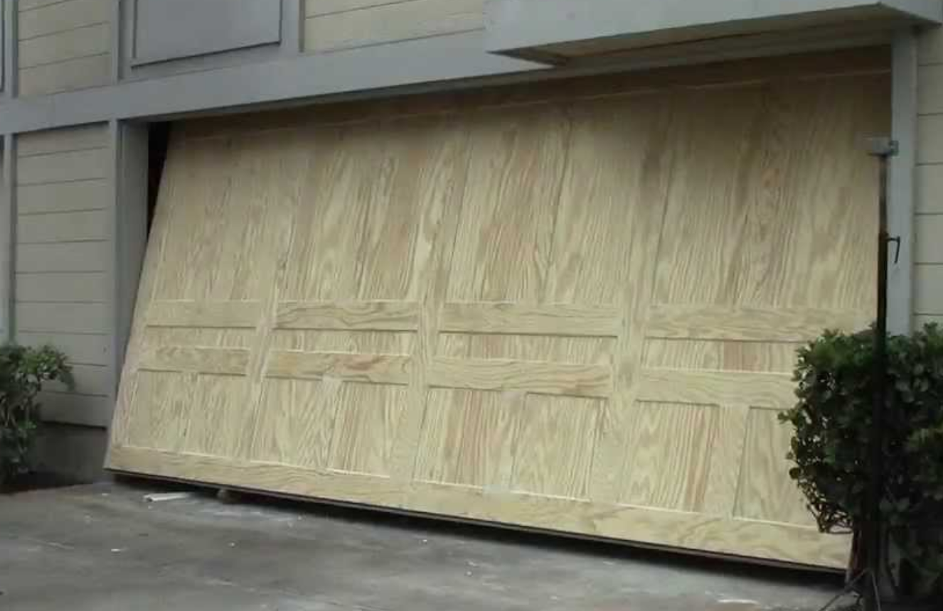 Entrance to underground parking with clear prohibition signs and exit markings.